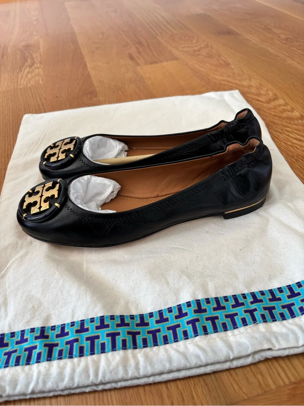 Brand New Tory Burch Black Leather Ballet Flats with Gold Medallion-Never worn